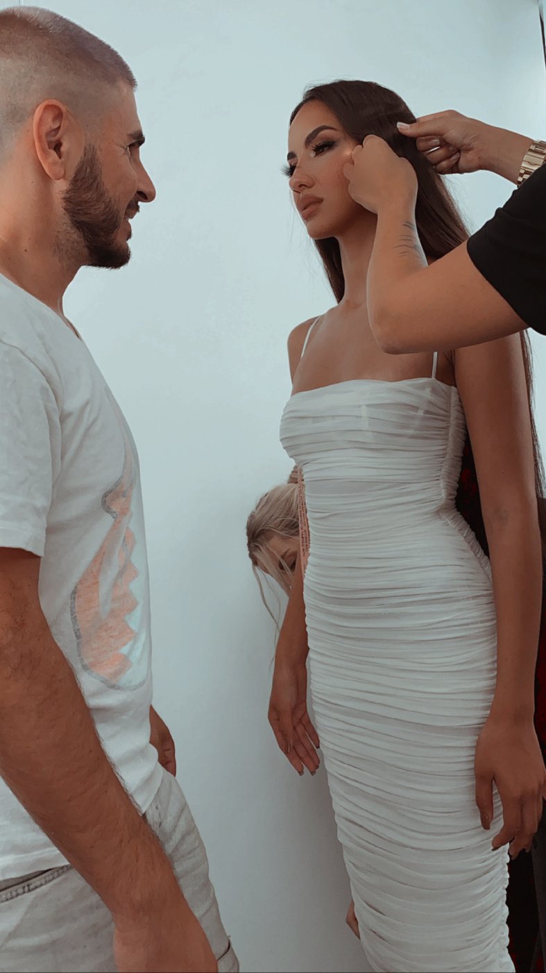 Jesse Janedy directing a photoshoot, behind the scenes